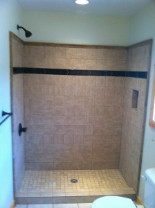 New tile shower in place of the old fiberglass tub/combo
